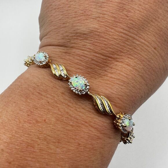 7" Lab created opal and diamond accent tennis bracelet in gold over 925! - Picture 5 of 16